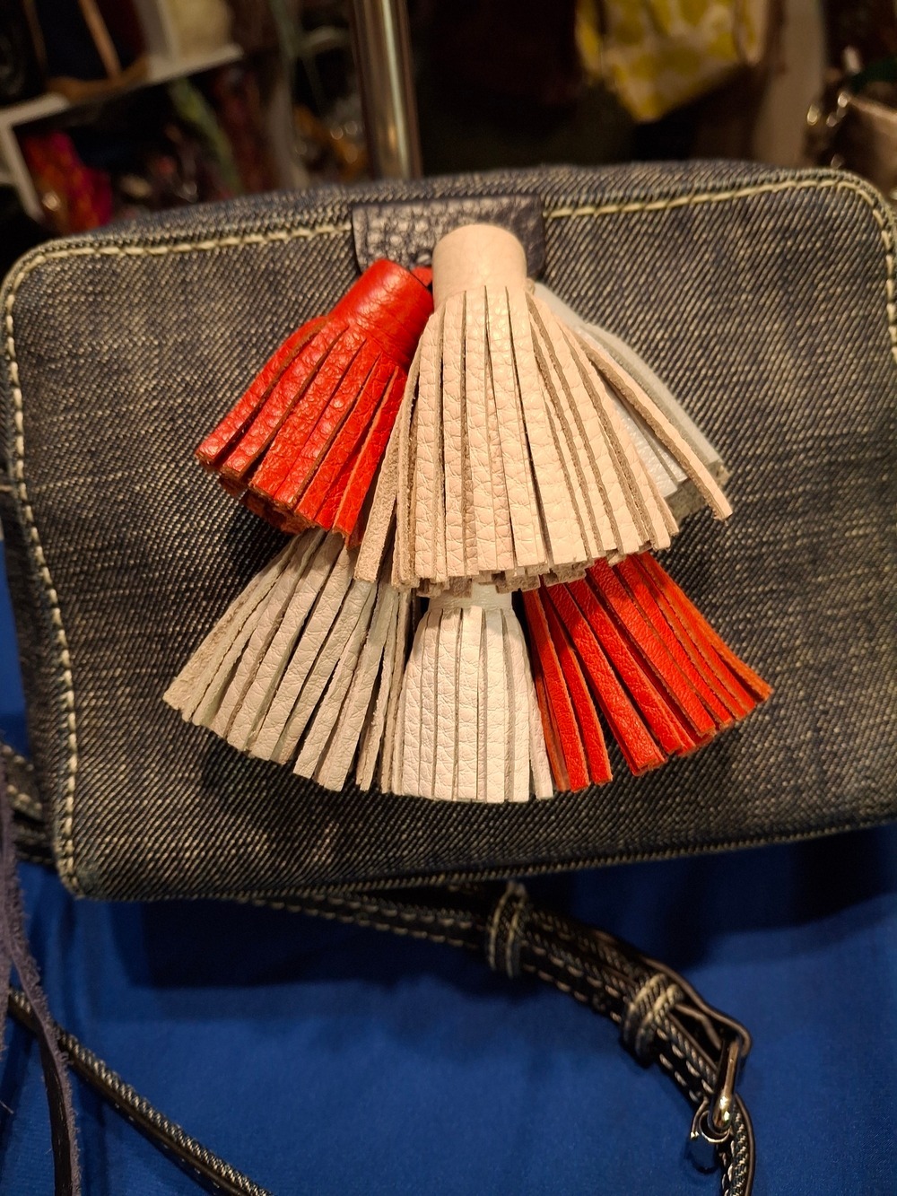 Rebecca Minkoff Mini Sofia Denim Crossbody Bag with Orange and Cream Tassels - Picture 8 of 11